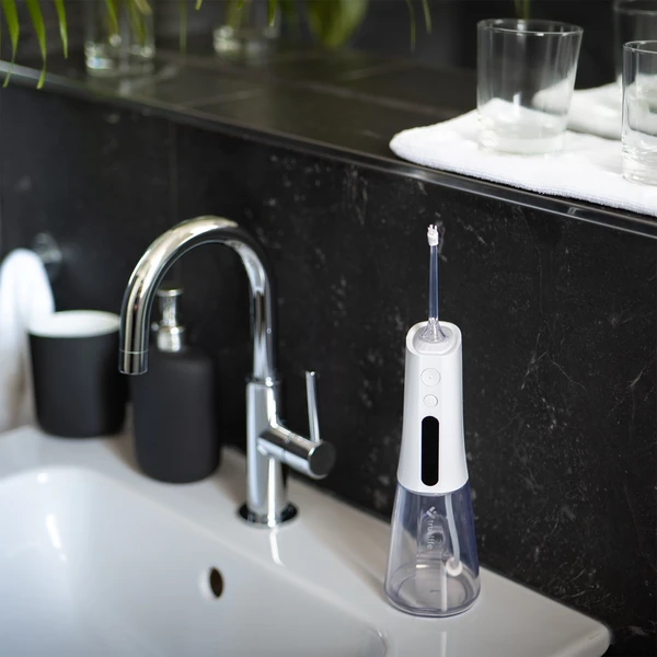 TrueLife AquaFloss Compact L100 - Ústne sprchy - Obrázok 74755bdd1afe42b991a14f9342f8b7f1